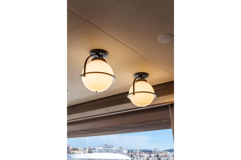 Slide: The Image of Ceiling lights on Sirena 118 yacht, 2027 model, with elegant spherical design. - 16