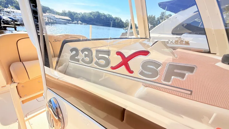 Slide: The Image of 2018 Scout 235 XSF with stylish interior and modern design, perfect for leisure activities. - 1