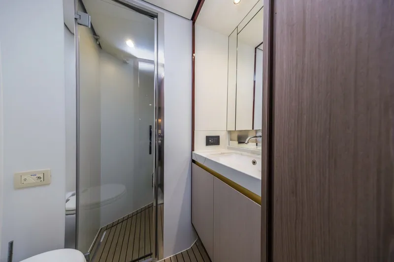 Slide: The Image of Modern bathroom interior on 2021 Azimut Fly 60 yacht, featuring sleek design and fixtures. - 54