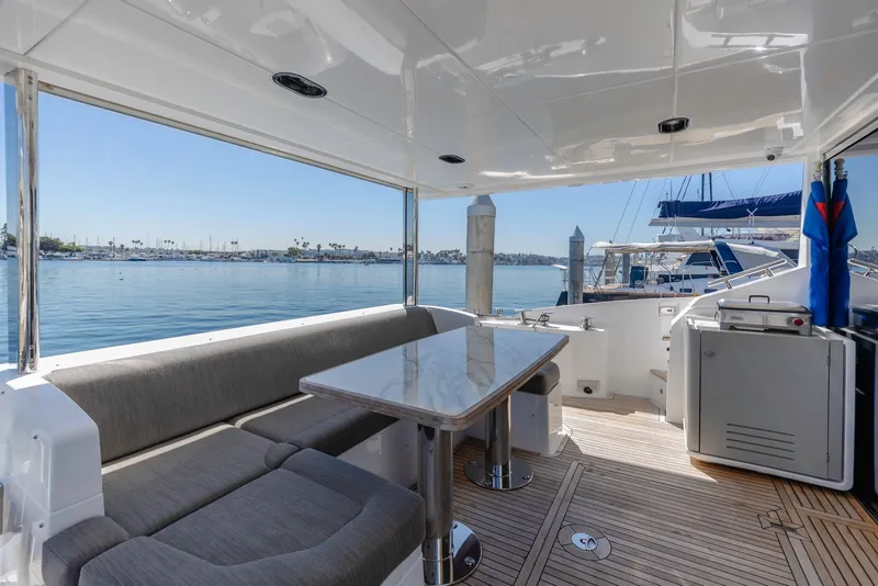 Slide: The Image of Outdoor seating area on 2021 Azimut Fly 60 yacht with ocean view. - 14