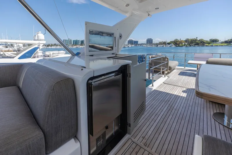 Slide: The Image of Luxurious Azimut Fly 60 yacht deck with seating and ocean view, 2021 model. - 20