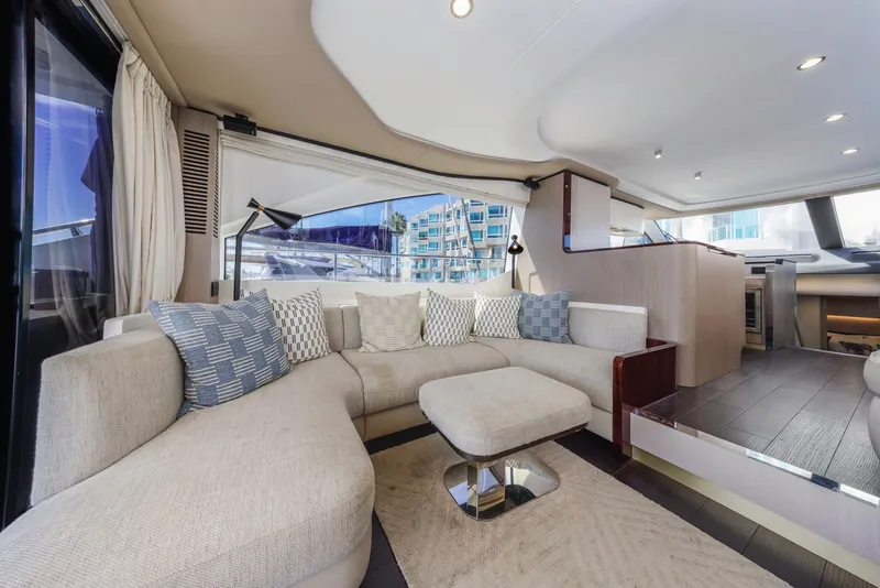 Slide: The Image of Luxurious interior of 2021 Azimut Fly 60 yacht with modern seating and elegant decor. - 37
