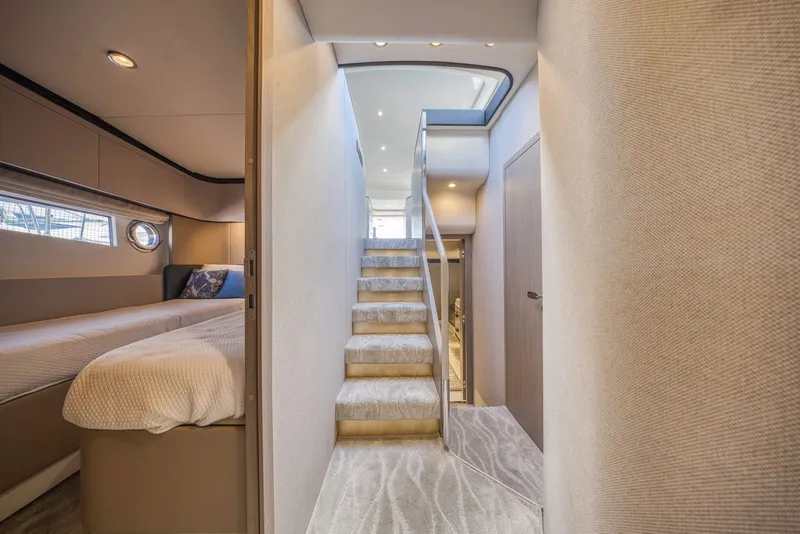 Slide: The Image of Luxurious interior of 2021 Azimut Fly 60 yacht with elegant staircase and cozy bedroom. - 55