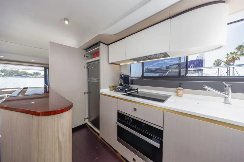 Slide: The Image of Modern kitchen interior of 2021 Azimut Fly 60 yacht with sleek design and waterfront view. - 58