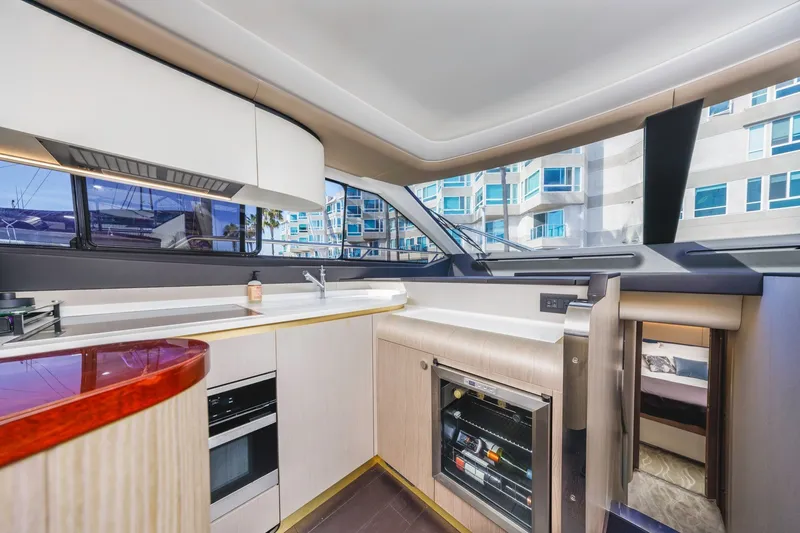 Slide: The Image of Luxurious interior of 2021 Azimut Fly 60 yacht kitchen with modern appliances and sleek design. - 56