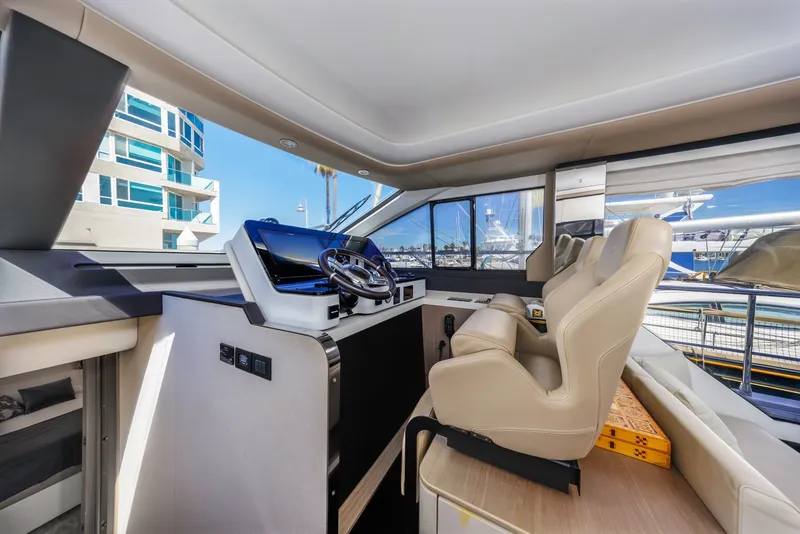 Slide: The Image of Interior of 2021 Azimut Fly 60 yacht with modern helm and luxurious seating. - 40