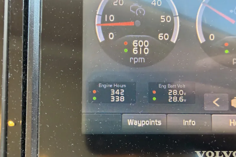 Slide: The Image of Dashboard of 2021 Azimut Fly 60 showing engine hours and battery voltage. - 69
