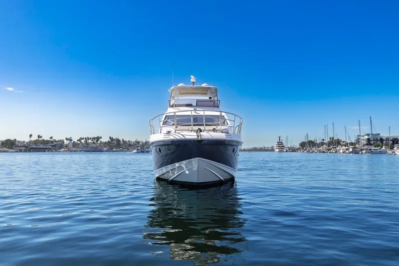 Slide: The Image of Front view of a 2021 Azimut Fly 60 yacht on calm waters. - 6