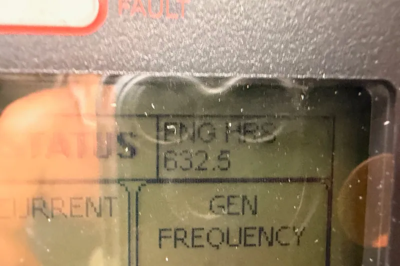 Slide: The Image of Close-up of a digital display showing generator frequency at 632.5 Hz on Azimut Fly 60. - 70