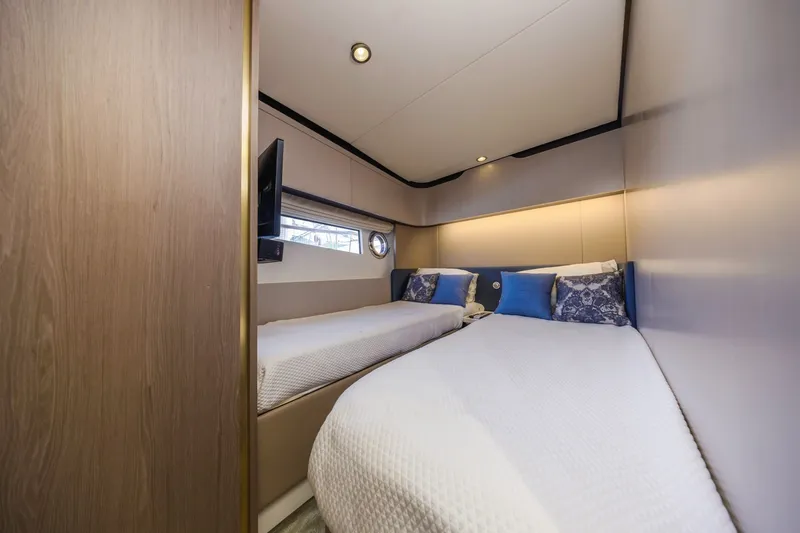 Slide: The Image of Luxurious twin bedroom in 2021 Azimut Fly 60 yacht with modern decor. - 50