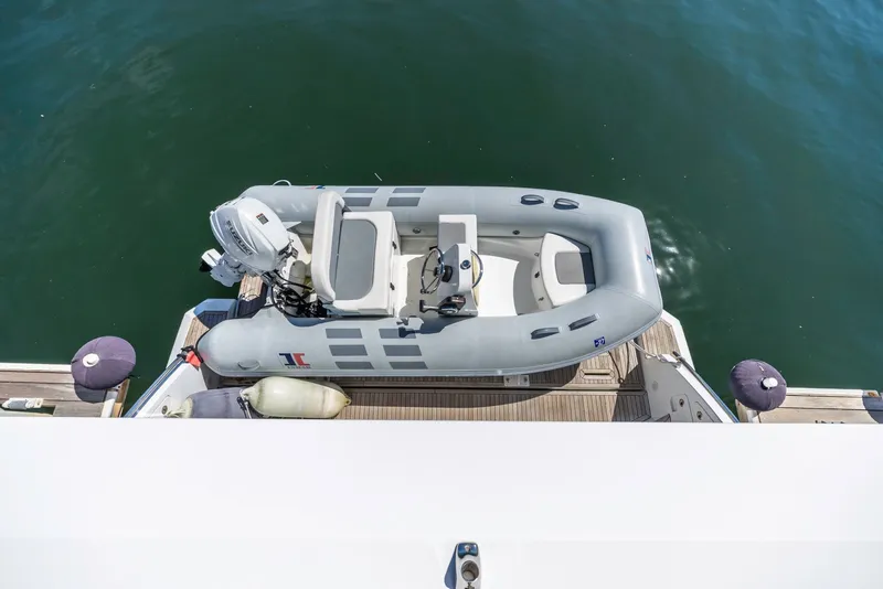 Slide: The Image of Top view of a 2021 Azimut Fly 60 yacht with an inflatable boat. - 31