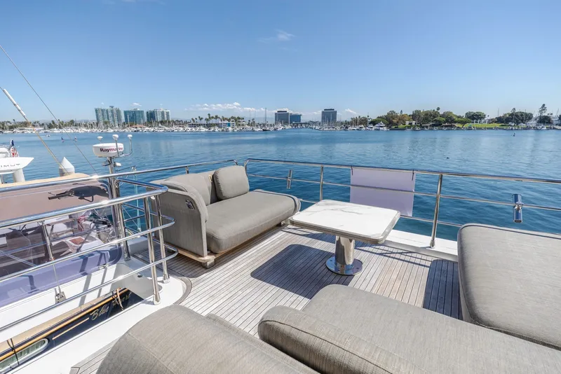 Slide: The Image of Luxurious 2021 Azimut Fly 60 yacht deck with waterfront view and comfortable seating. - 30