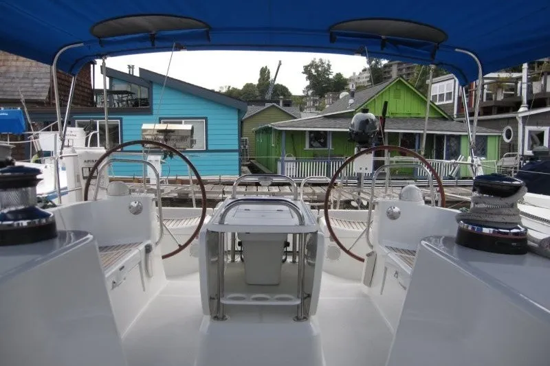 Slide: The Image of Cockpit view of 2013 Jeanneau Sun Odyssey 44i sailboat with dual steering wheels. - 20