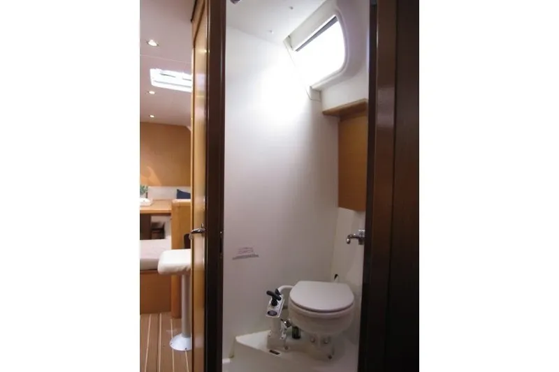 Slide: The Image of Interior view of 2013 Jeanneau Sun Odyssey 44i yacht bathroom with modern fixtures. - 16
