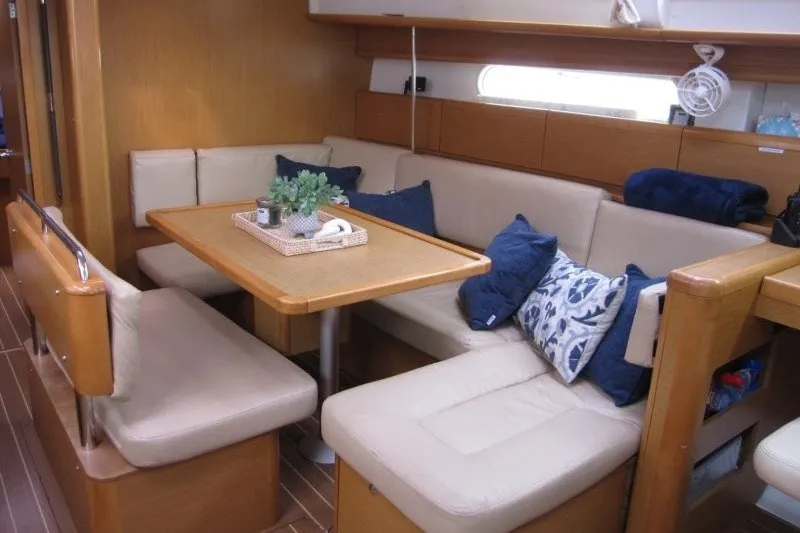 Slide: The Image of Interior of 2013 Jeanneau Sun Odyssey 44i yacht with cozy seating and table. - 17