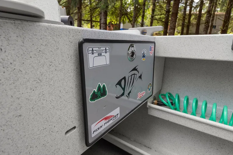 Slide: The Image of 2021 KingFisher 2625 Coastal Express boat with stickers and storage compartment. - 20
