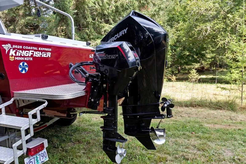 Slide: The Image of 2021 KingFisher 2625 Coastal Express boat with Mercury outboard motors in a wooded area. - 14