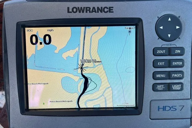 Slide: The Image of Lowrance HDS 7 marine GPS displaying navigation map on a 2007 Sea Ray Sundancer 320. - 13