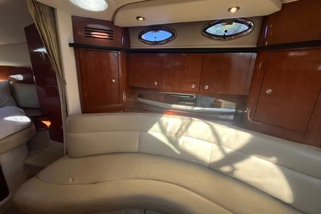 Slide: The Image of Luxurious interior of 2007 Sea Ray Sundancer 320 yacht with elegant wood cabinetry. - 30