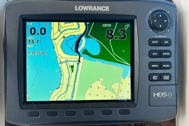 Slide: The Image of Lowrance HDS8 marine GPS displaying navigation map and depth on a 2007 Sea Ray Sundancer 320. - 12