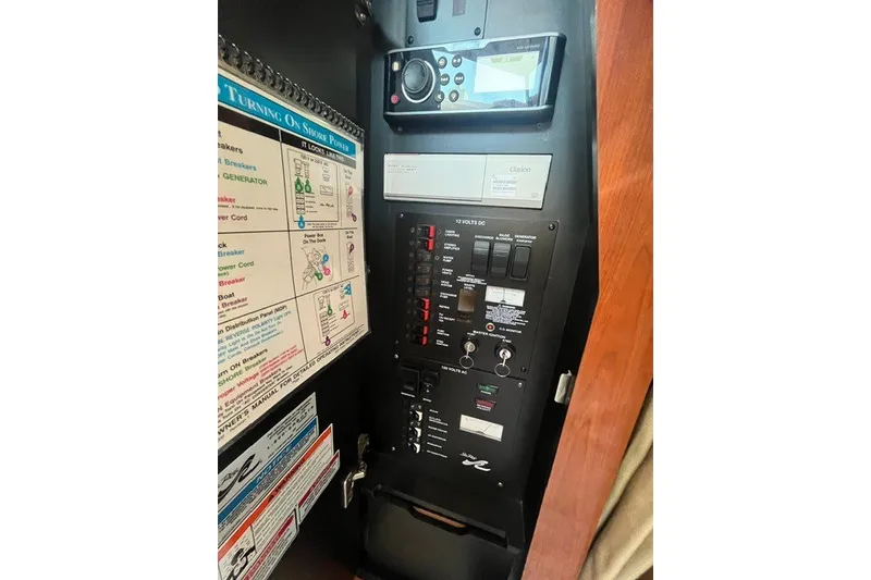Slide: The Image of Electrical control panel of a 2007 Sea Ray Sundancer 320 boat. - 31