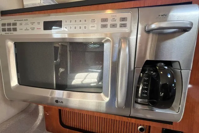 Slide: The Image of Built-in LG microwave and coffee maker in 2007 Sea Ray Sundancer 320 yacht kitchen. - 38