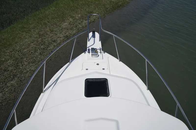 Slide: The Image of Manufacturer Provided Image: Top view of 2017 Parker 2120 Sport Cabin boat near shoreline. - 1