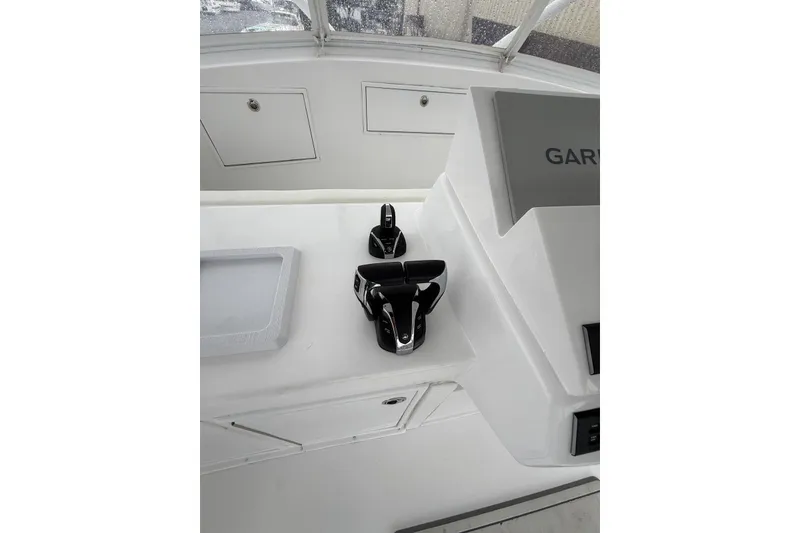 Slide: The Image of Control panel of 1984 Ocean 55 Super Sport yacht with Garmin equipment. - 16