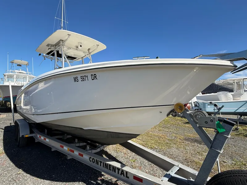 Slide: The Image of A 2006 Boston Whaler 270 Outrage on a trailer, ready for the water. - 47