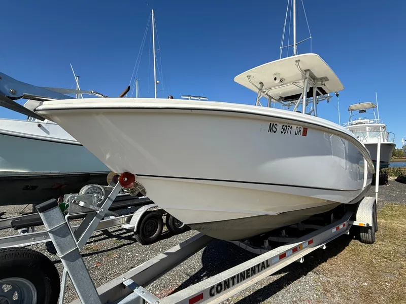 Slide: The Image of A 2006 Boston Whaler 270 Outrage on a trailer, ready for use. - 48