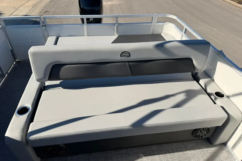 Slide: The Image of 2027 Sun Tracker Party Barge 22 RF DLX with spacious seating and cup holders. - 22
