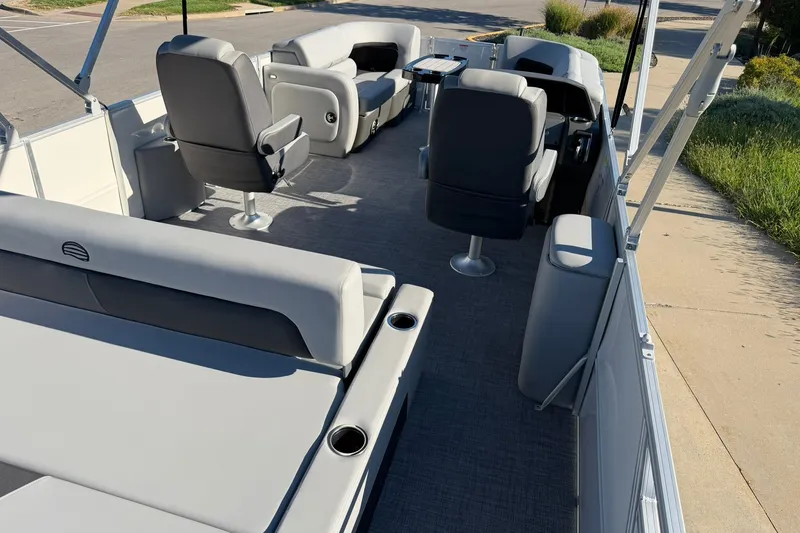 Slide: The Image of 2027 Sun Tracker Party Barge 22 RF DLX with spacious seating and modern design. - 26