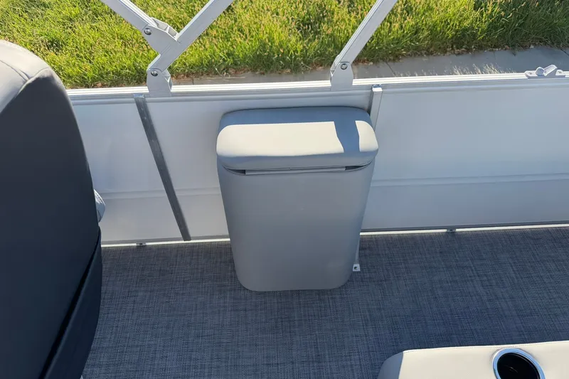 Slide: The Image of Interior of 2027 Sun Tracker Party Barge 22 RF DLX with seating and storage. - 24