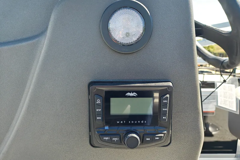 Slide: The Image of 2027 Sun Tracker Bass Buggy 18 DLX dashboard with Wet Sounds audio system. - 15