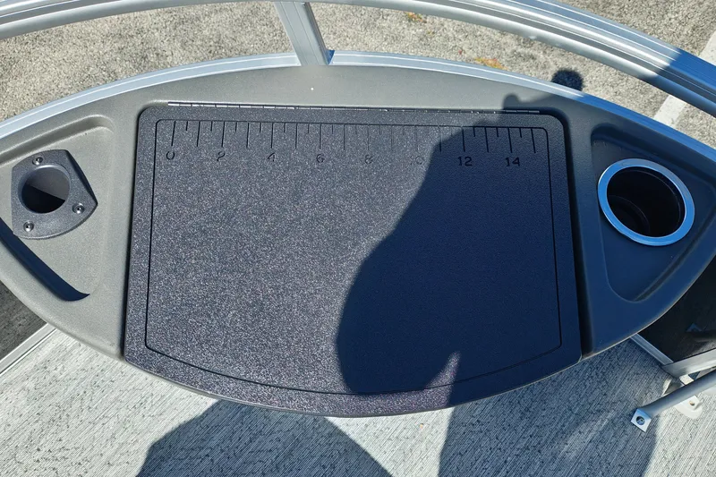 Slide: The Image of 2027 Sun Tracker Bass Buggy 18 DLX fishing station with ruler and cup holders. - 39