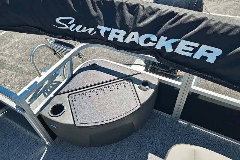 Slide: The Image of 2027 Sun Tracker Bass Buggy 18 DLX boat with covered seating and fishing station. - 28