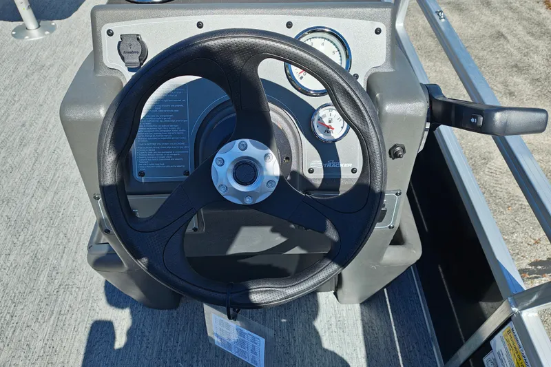 Slide: The Image of Steering wheel and dashboard of 2027 Sun Tracker Bass Buggy 18 DLX boat. - 19