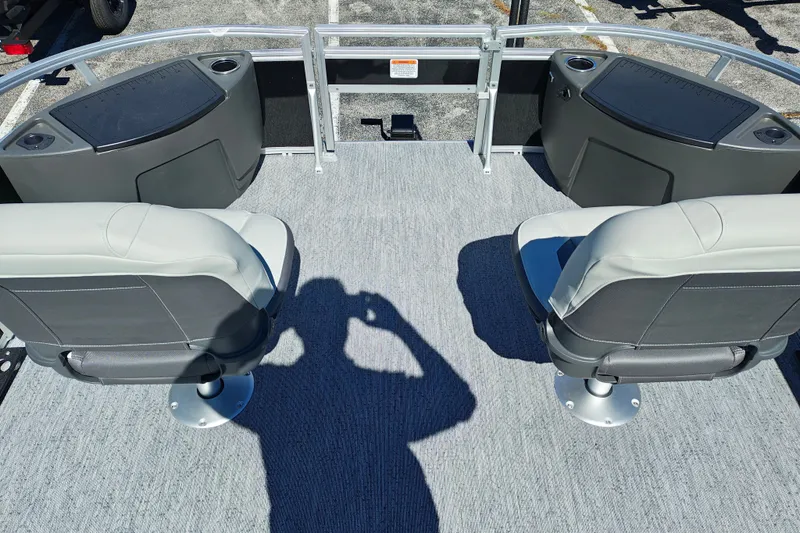 Slide: The Image of 2027 Sun Tracker Bass Buggy 18 DLX boat interior with two seats and fishing station. - 36