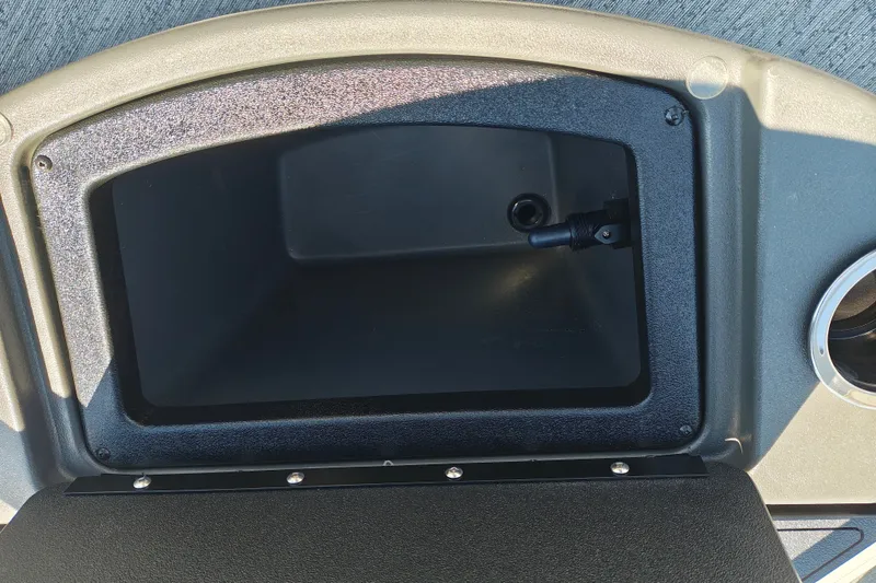 Slide: The Image of Storage compartment of 2027 Sun Tracker Bass Buggy 18 DLX boat. - 29