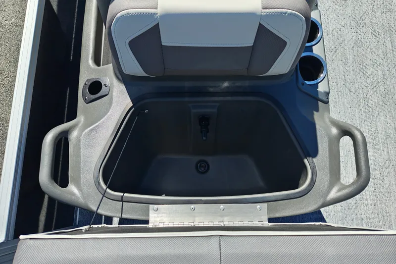 Slide: The Image of 2027 Sun Tracker Bass Buggy 18 DLX boat seat with storage compartment and cup holders. - 17