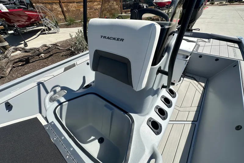 Slide: The Image of 2027 Tracker Bass Tracker Classic CC boat interior with seating and storage compartments. - 17