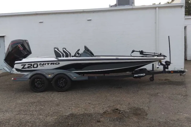Slide: The Image of 2027 Nitro Z20 XL boat on trailer, parked outdoors. - 1