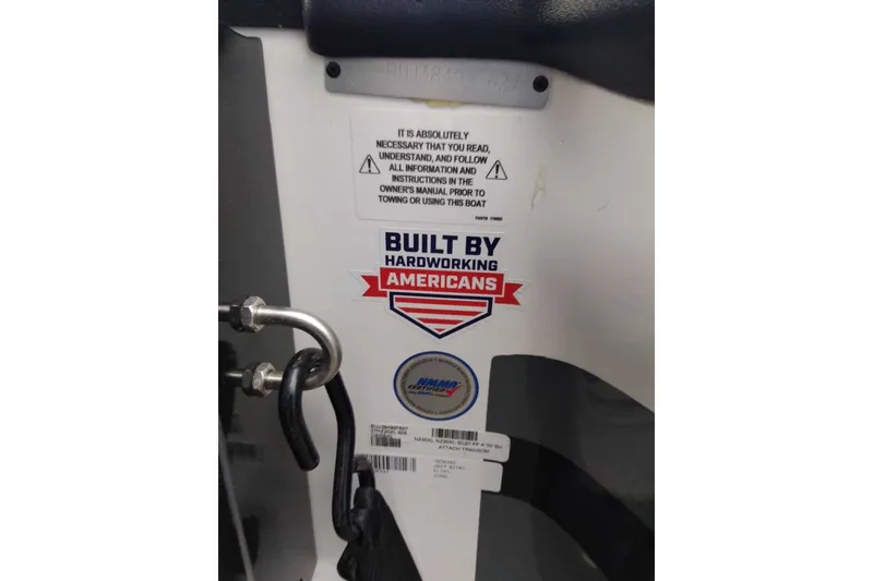 Slide: The Image of Sticker on Nitro Z20 XL 2027 boat, "Built by Hardworking Americans" with safety instructions. - 40