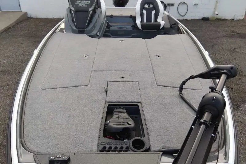 Slide: The Image of 2027 Nitro Z20 XL boat deck with seating and motor, featuring a sleek design. - 5