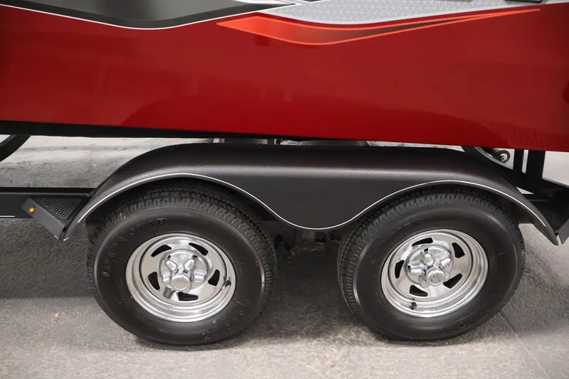 Slide: The Image of 2022 Tracker Targa V-19 WT trailer with dual wheels and red exterior. - 58