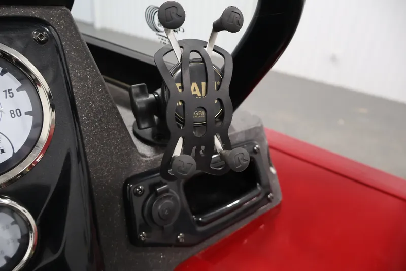 Slide: The Image of Dashboard of 2022 Tracker Targa V-19 WT with phone holder and gauges. - 31