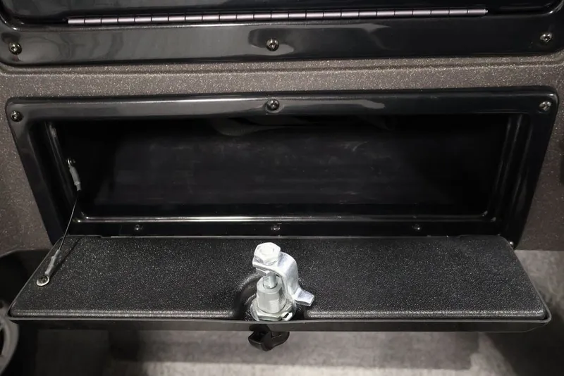 Slide: The Image of Open storage compartment in 2022 Tracker Targa V-19 WT boat. - 29