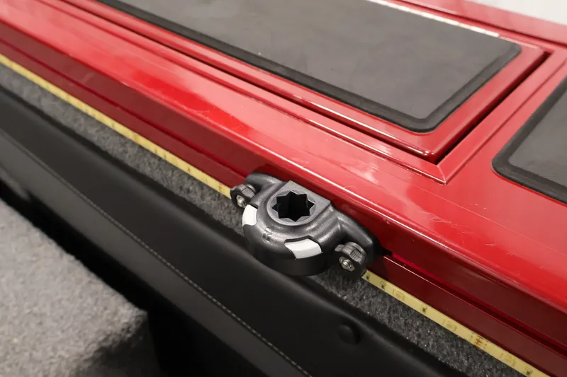 Slide: The Image of 2022 Tracker Targa V-19 WT boat detail with red trim and mounting bracket. - 48
