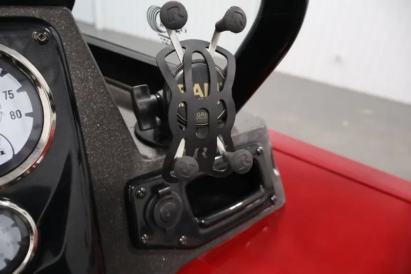 Slide: The Image of Dashboard of 2022 Tracker Targa V-19 WT with phone holder and gauges. - 30
