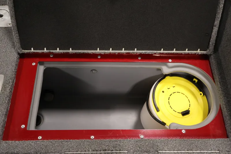 Slide: The Image of Storage compartment in 2022 Tracker Targa V-19 WT boat with yellow lid container. - 41